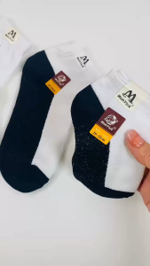 Linaria These trendy color-blocked preppy short socks are a popular choice for both men and women. They are breathable odor-resistant and made of high-quality pure cotton with a black sole. Sizes 26-48 are available