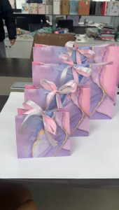 5pcs Premium Happy Times Luxury Pink Gift Bag with Elegant Pink and Silver Dual Tone Ribbons High Quality Thick Card Paper Bag Perfect for Wedding Souvenirs Birthdays Mothers Day & Corporate Gifts Available in 4 Sizes Durable Stylish Design Fast Shipping