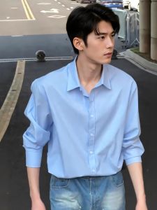 เสื้อเชิ้ตลายทางสีน้ำเงิน ทรงหลวม แขนยาว สำหรับผู้ชาย เสื้อเชิ้ตแฟชั่นฤดูใบไม้ร่วง ใส่ได้ทุกวัน เสื้อเชิ้ตแขนยาวลายดอกไม้