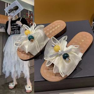 รองเท้าแตะส้นแบนพื้นหนาสำหรับผู้หญิงในช่วงฤดูร้อนปี 2025 รองเท้าแตะชายหาดสไตล์ฝรั่งเศสระดับไฮเอนด์สำหรับสวมใส่กลางแจ้ง