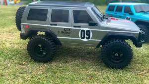 SG1803 1/18 4WD RC Off-Road Car Rock Crawler Climbing Racing Vehicle 2.4G Remote Control Pinecone Forest Style Toy Gift for Boys