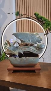 น้ำพูดฮวงจูกมือกับปลาอโรวาน รุ่นปลามังกรเสริมกับความร่ำรวย ซึ่งเป็นของขวัญของฝากมงคล