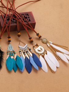 วินเทจสไตล์ชาติพันธุ์สร้อยคอยาวขนนกสําหรับผู้หญิงหรูหราการออกแบบที่ไม่ซ้ํากันลมแห่งชาติจี้โลหะผสมเงินชุบทอง