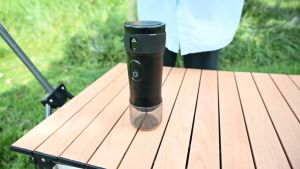 MIUI เครื่องชงกาแฟรถยนต์แบบพกพา 100W ให้ความร้อนเร็ว ความดัน 5bar ใช้ได้ทั้ง N แคปซูลและกาแฟบด ความจุ 150ml