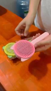 Lược chải lông cho Chó Mèo có nút bấm nhả lông tai mèo (bịch) mẫu mới - Hara Pet Store
