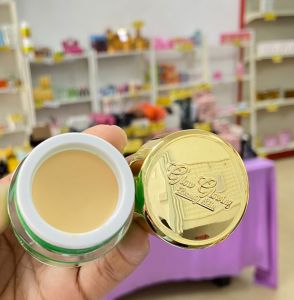 GLOW GLOWING DAY LOOSE Skin Care Set - Creamy texture compact size gold lid retail display beauty product.