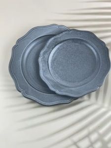 จานเซรามิค ทรงดอกไม้  สีเทา  มี 2 ขนาด  8.5 นิ้ว และ 10.3 นิ้ว