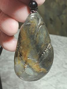 Gegegems Collection Hetian Pebble Nephrite with raw "Jade Skin" and pores kept whitish light green hue blackish hand carved Landscape pendant (with certificate)