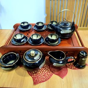 Bộ ấm chén Bát Tràng cao cấp hoa trong lòng gốm men hoả biến hổ phách viền vàng 24k