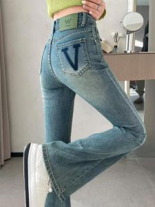 กางเกงยีนส์ทรงหลวมเอวสูงสำหรับผู้หญิง กางเกงขายาวทรงหลวมขาบานพร้อมตัวอักษร กางเกงขายาวทรงเข้ารูปสำหรับฤดูใบไม้ร่วงและฤดูหนาว