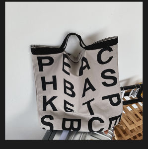 กระเป๋าผ้าใบลายดอกไม้สไตล์เกาหลีขนาดใหญ่แบบยูนิเซ็กซ์ กระเป๋าสะพายไหล่แบบอเนกประสงค์ กระเป๋าสะพายข้างลายตัวอักษรย้อนยุค สไตล์ศิลปะ กระเป๋าถือสุดหรู