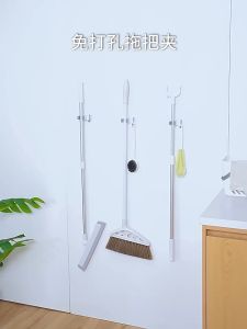 Móc treo cây lau nhà dán tường 2 trong 1