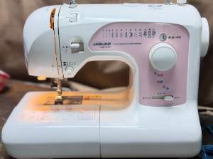 Jaguar sewing machine built in speed adjustment