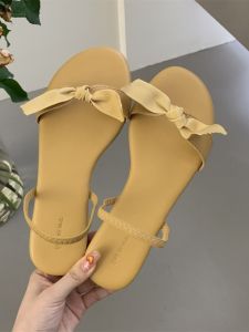 รองเท้าแตะส้นแบนแบบผูกโบว์รูปผีเสื้อ รองเท้าสไตล์โรมันสำหรับฤดูร้อน สไตล์เกาหลี รองเท้าสวมสบาย รองเท้าแฟชั่นส้นแบน