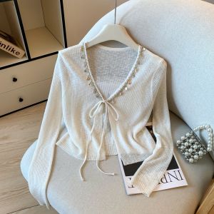 เสื้อคาร์ดิแกนถักไหมน้ำแข็งสไตล์โบฮีเมียน แขนยาว บาง โปร่งแสง ป้องกันแสงแดด สำหรับผู้หญิง ฤดูร้อน 2025 คอวี ปกโปโล