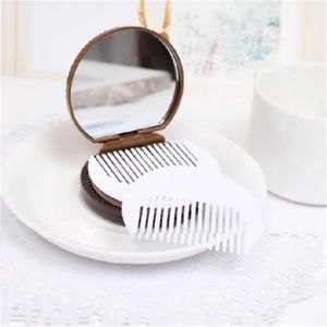 Gương mini cầm tay trang điểm nắp gập hình bánh quy dễ thương kèm lược-HAUSE