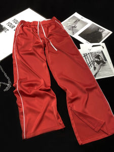 กางเกงกีฬาผ้าซาตินอะซิเตทสีแดงสะท้อนแสง กางเกงขายาวทรงหลวมเอวต่ำ กางเกงขายาวทรงหลวมสำหรับใส่ลำลองในฤดูใบไม้ร่วง