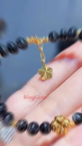 vòng tay nữ vàng tây đá thạch anh tóc đen tự nhiên vip mix charm cỏ 4 lá và bi cầu vàng tây vòng tay đá phong thủy hợp mệnh mộc mệnh thủy trang sức thiết kế đủ hóa đơn thẻ bảo hành