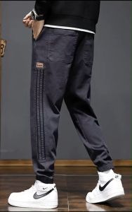 #041#กางเกงยีนขาจั้มผู้ชายแบบแถบข้างแฟชั่นสไตล์เกาหลีทรง อย่างเท่นเนื้อผ้าด้านซ้าย