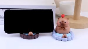 Mô hình Capybara đi tắm kiêm đế dựng điện thoại trang trí bàn học bàn làm việc tủ sách taplo ô tô