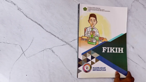 Buku Siswa Fikih Kelas 6 MI KEMENAG KMA 183