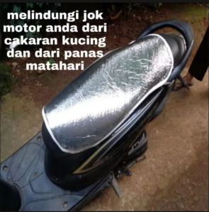 Pelindung kulit jok motor anti panas matahari