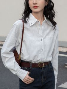 เสื้อเชิ้ตแขนยาวลายทางสไตล์ฝรั่งเศสย้อนยุค สไตล์เรียบง่าย ดีไซน์เก๋ไก๋ ใส่ได้หลากหลาย สำหรับผู้หญิงวัย 25-29 ปี