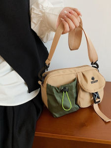 กระเป๋าผ้าใบทรงสี่เหลี่ยมเล็กแบบสะพายข้างลำลองสำหรับใส่โทรศัพท์มือถือในชีวิตประจำวันแบบลำลองสำหรับกลางแจ้ง กระเป๋าแฟชั่นสตรี 2025 รุ่นใหม่