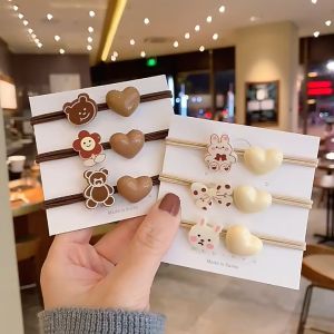 Dây cột tóc thun màu be và màu nâu đính trái tim kèm charm bông hoa gấu thỏ hoạt hình đáng yêu H86