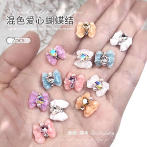 Dorisna อุปกรณ์อุปกรณ์ประดับตกแต่งเล็บศิลปะเพชรเทียม3มิติสำหรับการออกแบบเล็บสไตล์เกาหลีแบบโบว์ริบบิ้น 1/2ชิ้น