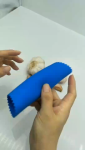 SG Stock Magic Garlic Clove Peeler Peel Twist Tool easy use