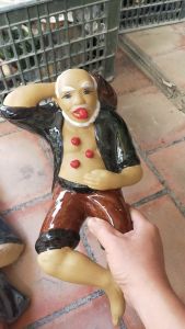 Tượng gốm há miệng chờ sung