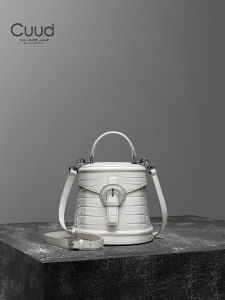 กระเป๋าถือทรงถังหนังแท้ระดับไฮเอนด์สำหรับผู้หญิง กระเป๋าสะพายไหล่แบบลำลอง ทรงกลม สไตล์ยุโรป กระเป๋าถือแบบหนังแท้ Cuiud