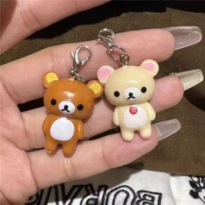 2 ชิ้น Kawaii Rilakkuma Easy Bear Keyrings Lazybear ตุ๊กตาพวงกุญแจกระเป๋าเสื้อผ้า Puller อุปกรณ์เสริมโทรศัพท์จี้ของขวัญ