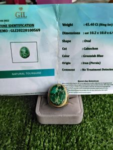 CINCIN FIRUS IRAN AAA Natural Tourquoise Ring with GIL Certificate 45.40 Ct Oval Cabochon Greenish Blue No Treatment Detected Set in Gold Band.