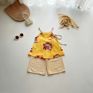 (4-28kg) Bộ Yếm Vàng Lụa Gấm Vân Gỗ NHÍM XÙ KIDS Cho Bé Gái 1 Tuổi Đến 8 Tuổi S029