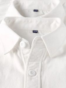 เสื้อเชิ้ตแขนยาวสีขาวคอโปโลผ้าฝ้ายแท้สไตล์เกาหลีหลวมๆ เสื้อเชิ้ตแฟชั่นฤดูใบไม้ร่วงสำหรับผู้หญิงวัย 18-24 ปี