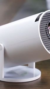 Smart Projector/LCD TV Proyektor mini 180 Lumens wifi Bluetooth Ultra HD Minimalis dan Multifungsi 720P HY300\\n\\nBikin kamarmu jadi bioskop dengan Smart Proyektor Android ini! Mudah dipasang di mana saja, baik di dalam ruangan atau halaman. Nggak perlu lagi TV besar! Dengan Bluetooth, kamu bisa sambungkan ke speaker, perangkat kerja, bahkan gamepad. Asyik, kan? Dapatkan sekarang juga!\\n\\n Keunggulan Proyektor HY300\\n\\n1. **Pengganti Smart TV** - Proyektor HY300 adalah solusi sempurna untuk pengganti smart TV. Dengan resolusi 720P dan kecerahan 120 ANSI Lumens, proyektor ini dapat memberikan pengalaman menonton yang luar biasa.\\n\\n2. **Portabel & Hemat Tempat** - Proyektor HY300 sangat portabel dan hemat tempat, ukurannya hanya 100,8X103,5MM dan beratnya hanya 0,75 kg. Dengan ukuran yang kecil ini, proyektor ini dapat dengan mudah dibawa kemana-mana.\\n\\n3. **Harga Terjangkau & Berkualitas** - Proyektor HY300 adalah pilihan yang sangat baik untuk mereka yang mencari proyektor berkualitas dengan harga terjangkau. Proyektor ini dilengkapi dengan fitur-fitur canggih seperti Bluetooth, Wi-Fi 6/5G, dan sistem Android 11.0.\\n\\n Fitur Utama Proyektor HY300\\n\\nProyektor HY300 memiliki beberapa fitur utama yang membuatnya menjadi pilihan yang sangat baik untuk pengguna:\\n\\n- **Bluetooth & Wi-Fi 6/5G** - Proyektor HY300 dilengkapi dengan Bluetooth dan Wi-Fi 6/5G, yang memungkinkan pengguna untuk menghubungkan proyektor ke perangkat lain seperti speaker, gamepad, dan perangkat kerja.\\n\\n- **Sistem Android 11.0 & Ribuan Aplikasi** - Proyektor HY300 menggunakan sistem operasi Android 11.0, yang memungkinkan pengguna untuk mengunduh ribuan aplikasi di Playstore.\\n\\n- **Keystone Otomatis & Layar Menyesuaikan Dinding** - Proyektor HY300 memiliki keystone otomatis dan layar yang dapat menyesuaikan dinding, yang memungkinkan pengguna untuk mengatur proyektor dengan mudah dan cepat.\\n\\n Spesifikasi Teknis Proyektor HY300\\n\\nBerikut adalah spesifikasi teknis Proyektor HY300:\\n\\n- **Resolusi Fisik**: 720P\\n\\n- **Kecerahan**: 120 ANSI Lumens\\n\\n- **Rasio Kontras**: 1500:1\\n\\n- **Jarak Proyeksi**: 1.2m-4m\\n\\n- **Konektivitas**: HDMI, USB, Wi-Fi 6/5G, Bluetooth 5.0\\n\\n- **Ukuran Dan Berat**: Ukuran 100,8X103,5MM / 0.75Kg\\n\\n Cara Memesan Proyektor HY300\\n\\nProyektor HY300 dapat dipesan dengan mudah melalui website resmi atau toko online terpercaya. Pengiriman INSTAN tersedia untuk pelanggan di Makassar, dan garansi 7 hari ganti baru juga tersedia untuk memastikan bahwa pelanggan mendapatkan produk yang berkualitas.\\n\\nDapatkan Proyektor HY300 sekarang juga dan nikmati pengalaman menonton yang luar biasa!\n}