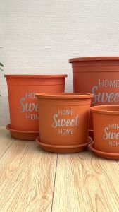 Chậu nhựa trồng cây VIETPOT màu cam hoa văn Sweet Home trồng hoa kiểng lá để nhà sân vườn.