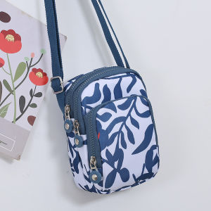 กระเป๋าผ้าใบพิมพ์ลายแฟชั่นสำหรับผู้หญิง กระเป๋าสะพายข้างแบบสะพายข้างขนาดเล็ก กระเป๋าใส่เหรียญ กระเป๋าใส่กุญแจ กระเป๋าสะพายไหล่ข้างเดียว