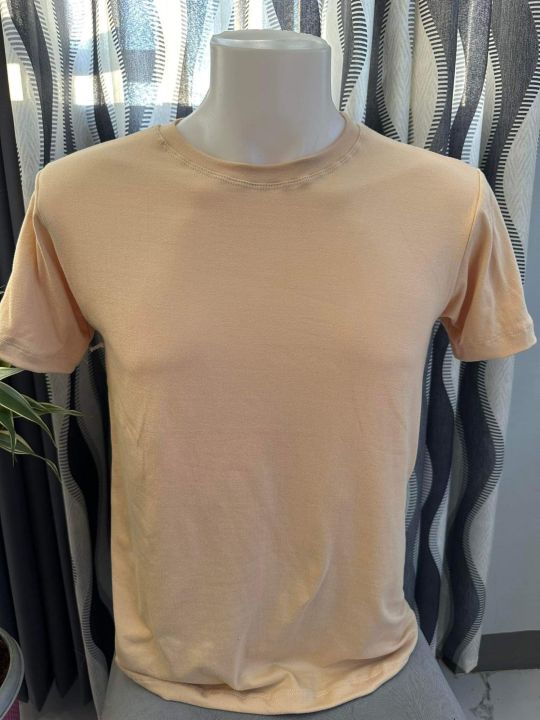 cream colored tee shirt