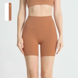 สีทึบผู้หญิงกีฬาโยคะกางเกงขาสั้นเอวสูงBreathableไม่มีเส้นที่น่าอึดอัดใจกางเกงขาสั้นขี่จักรยานการฝึกอบรมที่ครอบคลุมกางเกงขาสั้น