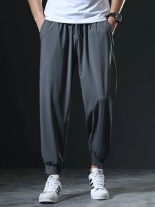 Mens Summer Thin Elastic Loose Ice Silk Quick Dry Nine-Piece Sports Pants plus Size Drapey Trousers Casual Fashion Leisure
