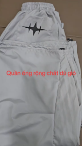 Quần dù ống rộng nam nữ phong cách ống suông dáng quần thùng thình lưng thun có dây luồng phối mí thân đính khoen xỏ dây
