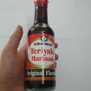 Sốt tẩm ướp truyền thống Teriyaki hiệu Kikkoman (chai thủy tinh) 250ml nhập khẩu Nhật bản