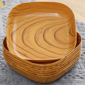 Creative Japanese imitation wood grain plastic bone spit plate snack plate fruit plate nut snack plate table storage