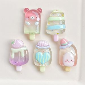 Bear-shaped ice cream popsicle with pastel colors and cute designs.
