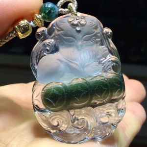 Pure natural crystal green ghost multi-layer treasure basin nine-tailed fox pendant with fox body design. The overall image is vivid and lifelike the shape is extremely realistic. The size is 43.5 * 30.5 * 11mm.