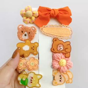 Hokkaido - Set 10 kẹp tóc hình nơ gấu màu cam hoạt hình dễ thương