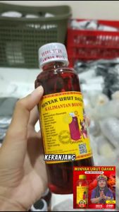 Minyak urut dayak Obat gosok pijat asli Perisai borneo ibu ida dayak Kalimantan kemasan 250ml